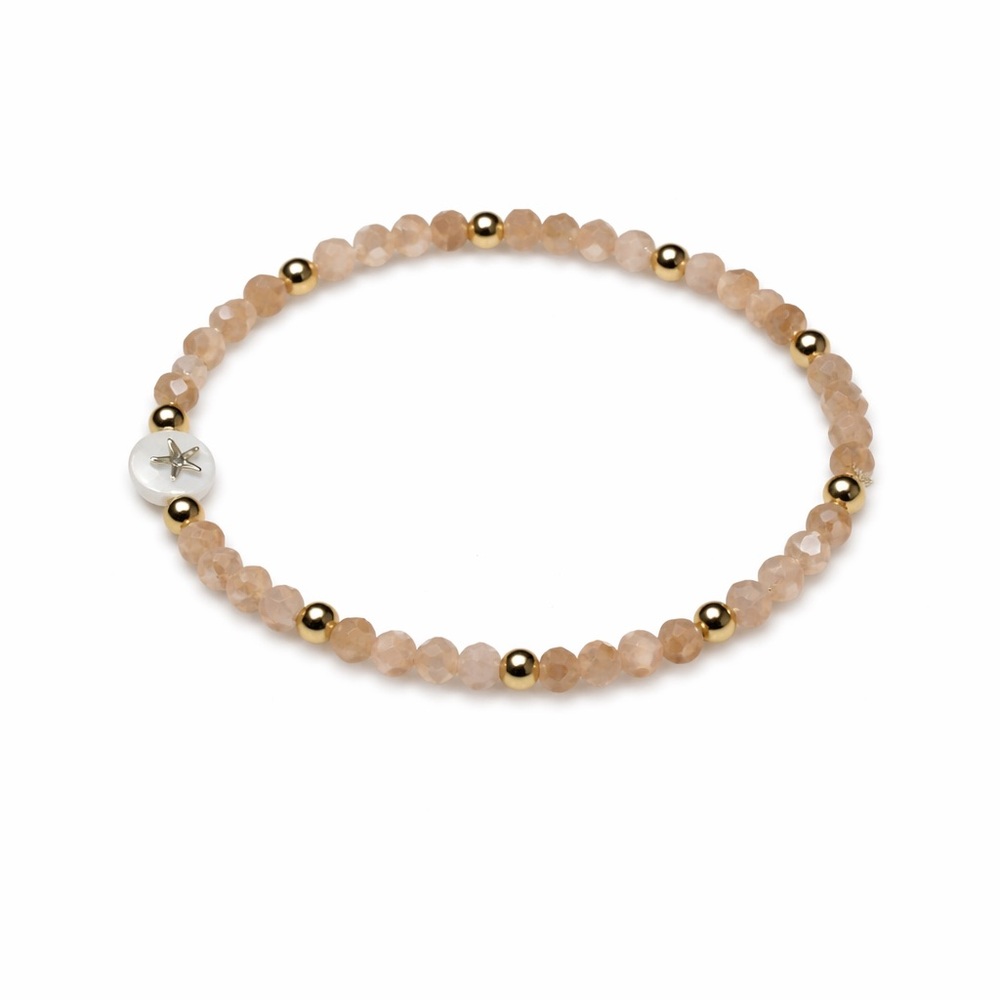 Beige beaded bracelet with starfish charm